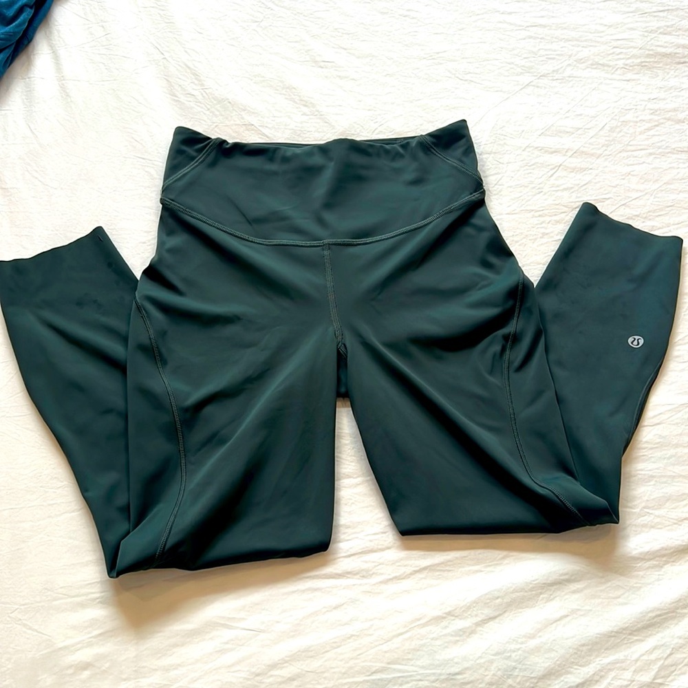 Lululemon Dark Green Crop Tight with waistline pocket